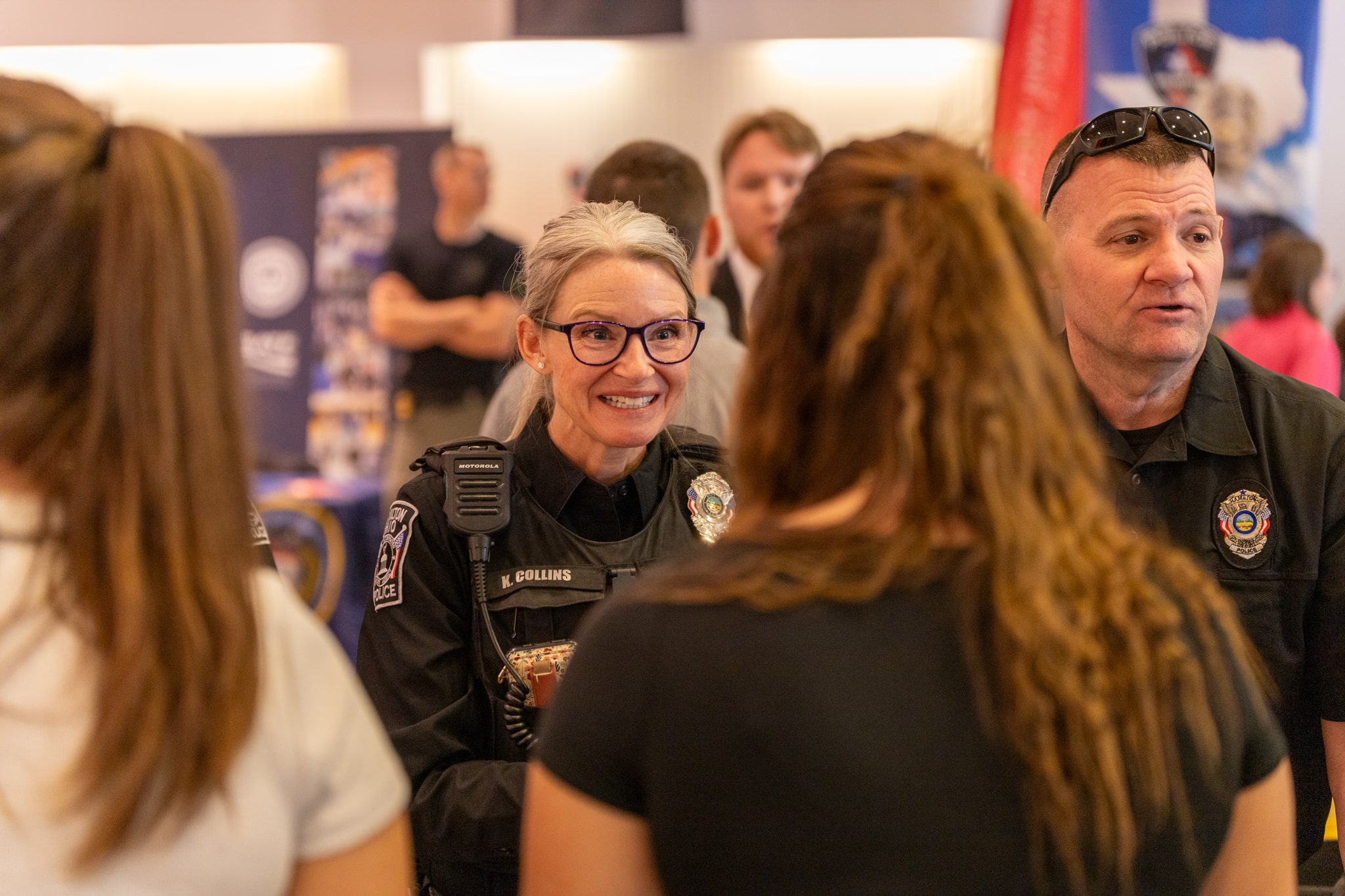 Police and Students talking at CJ Expo