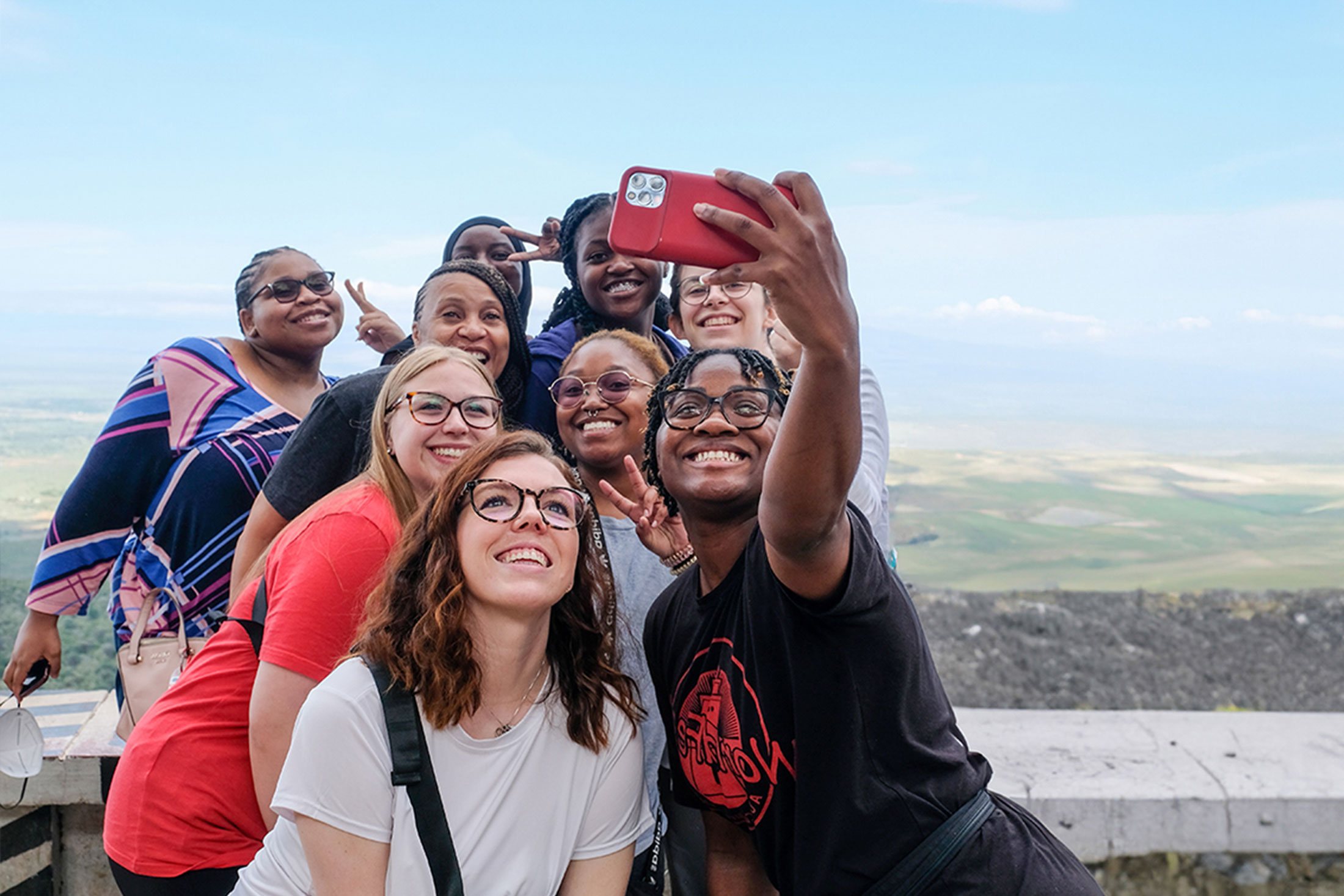 A group of University of Cincinnati students poses for a selfie in Tanzania